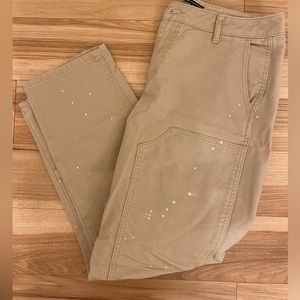 Beige denim paint splatter pants